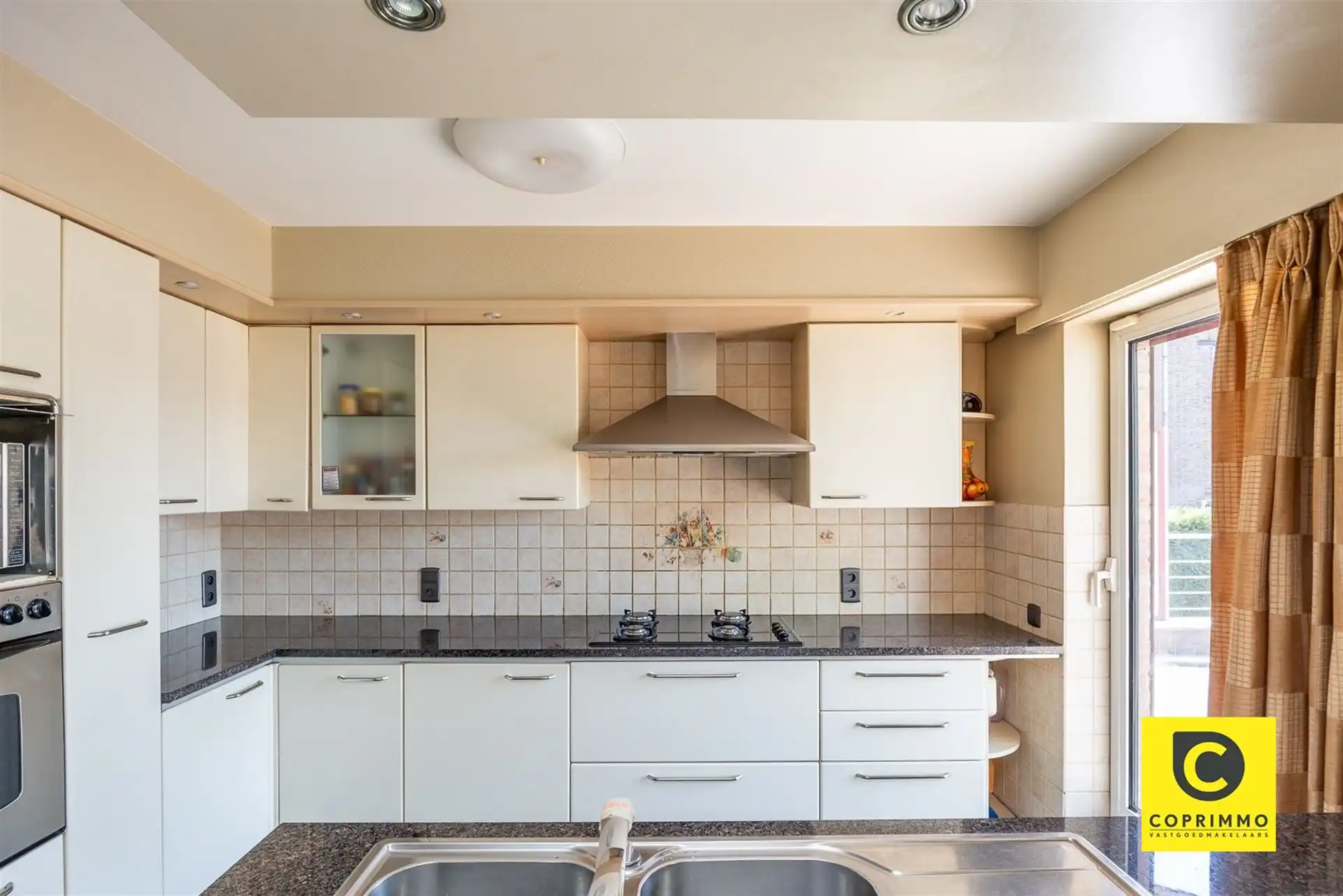 Riante woning met Z-tuin in de Oosterveldwijk ! foto 5