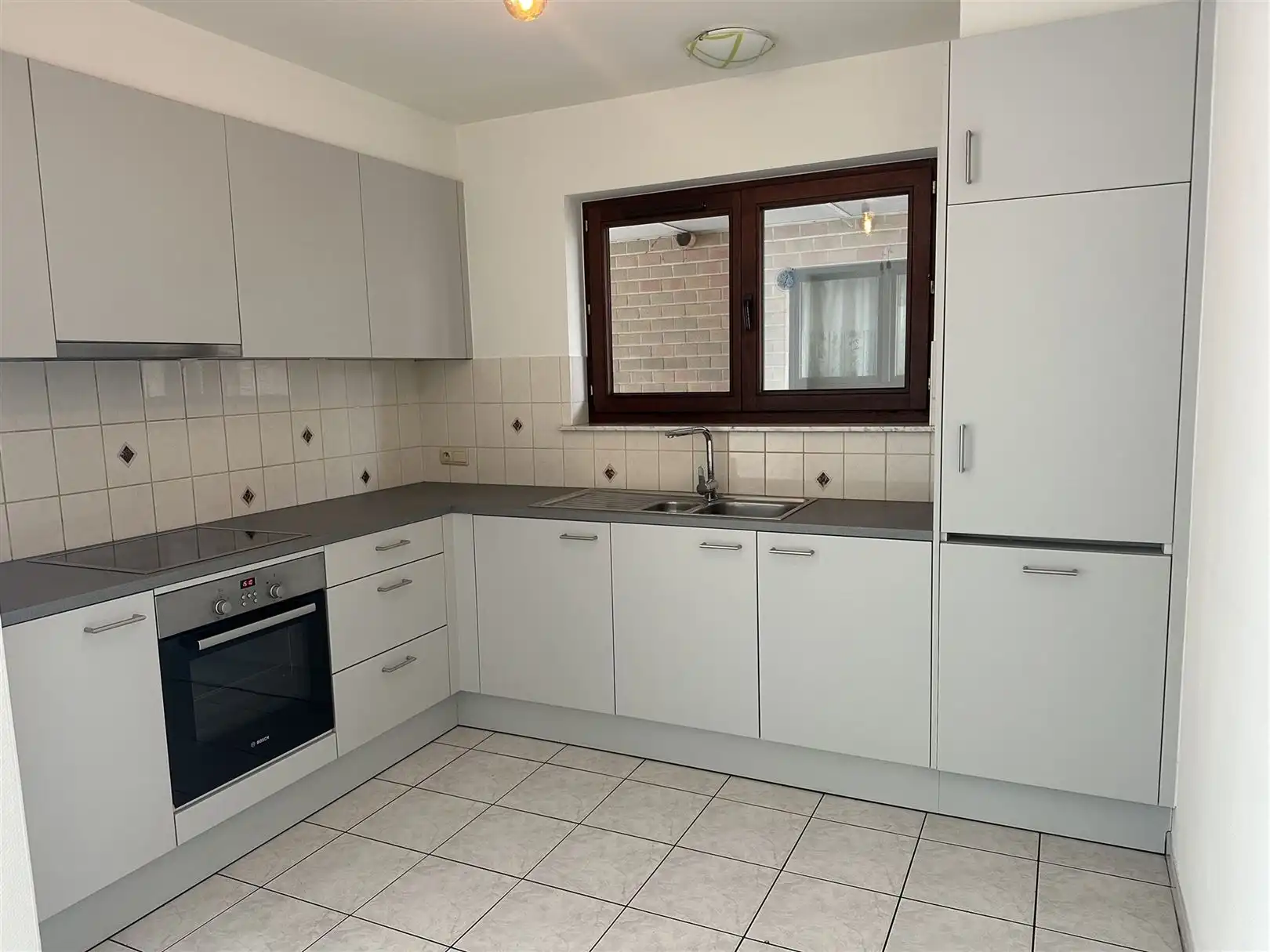 Gelijkvloers appartement te huur nabij station Oudenaarde  foto 2