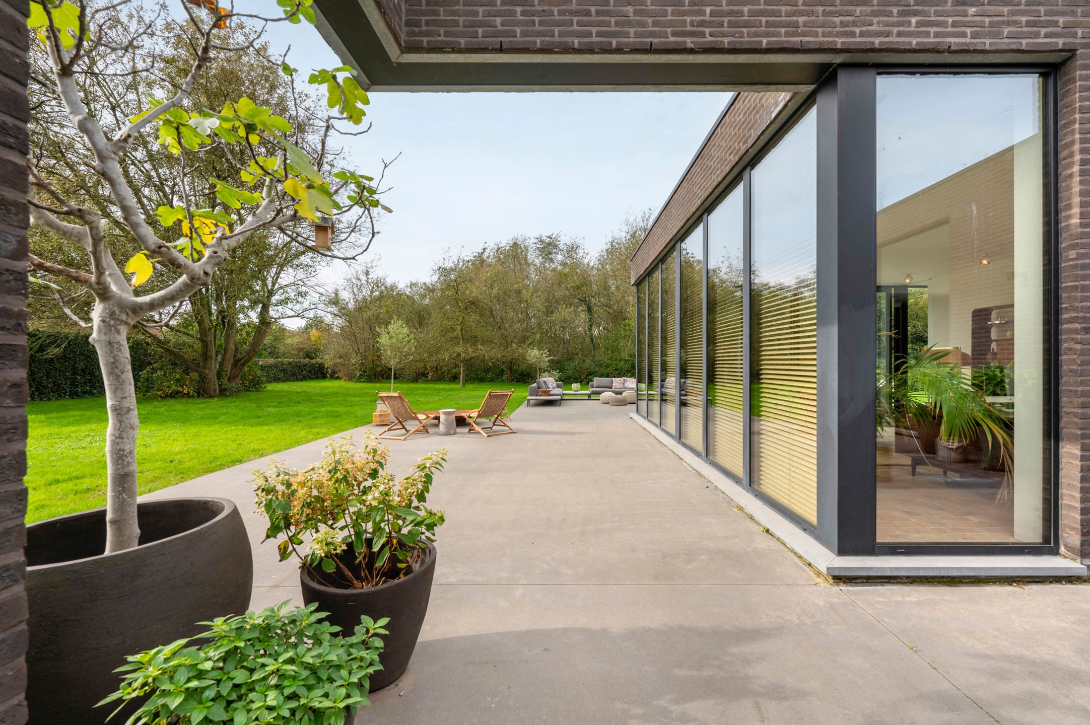 AARTSELAAR - Exclusieve villa met riante tuin! foto {{pictureIndex}}