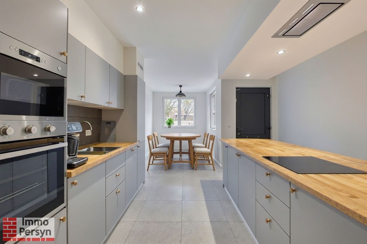 Moderne gezinswoning met 3 slaapkamers en gezellige tuin foto 2