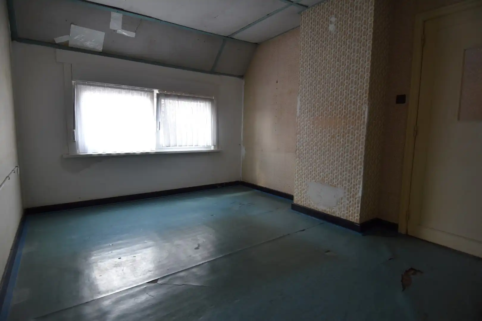 Woning met veel potentieel, garage en charmante tuin te koop in Kuurne foto 7
