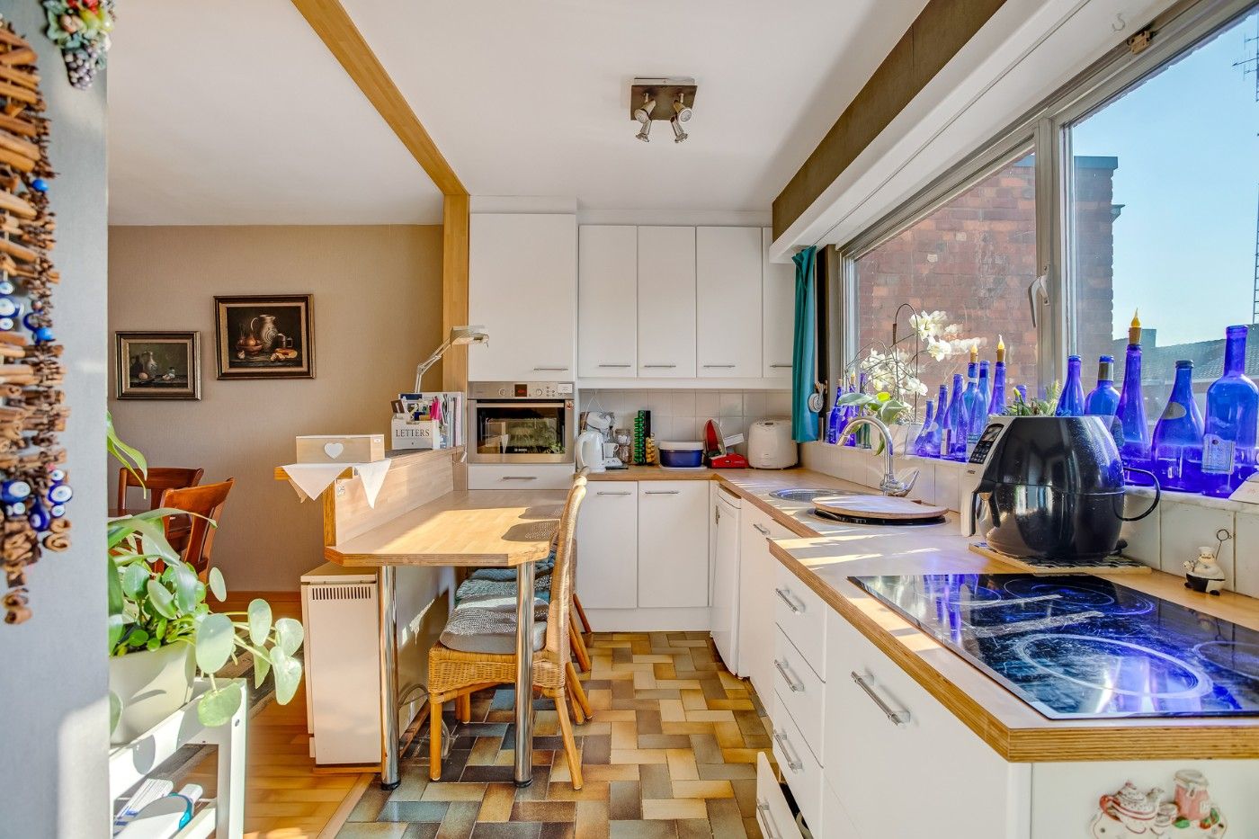 Centraal gelegen, op te frissen woning met 2 à 3 slpk., inpandige garage en tuin foto 8