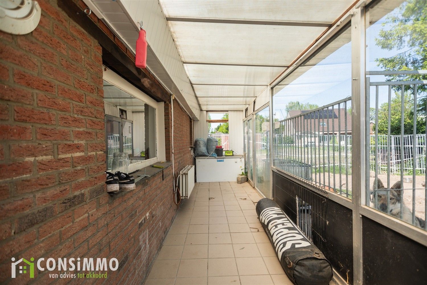 Gelijkvloerse woning met veel potentieel - vergunde nieuwbouwmogelijkheid in Genk foto 14