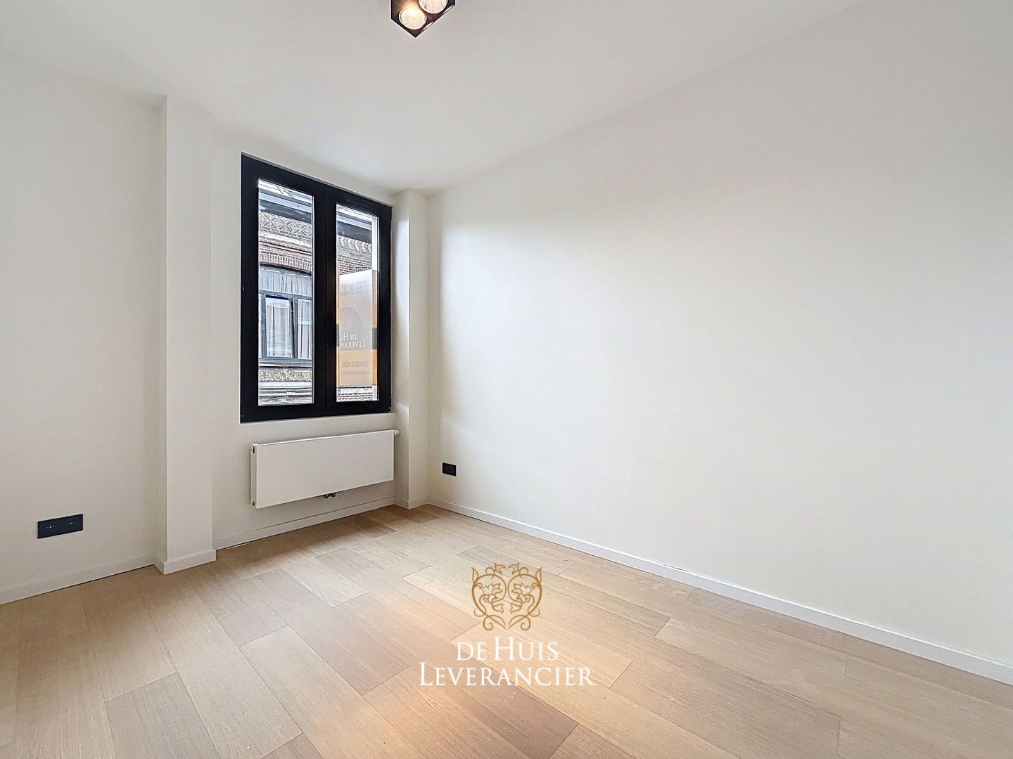 Gerenoveerde rijwoning met charme elementen  foto 14