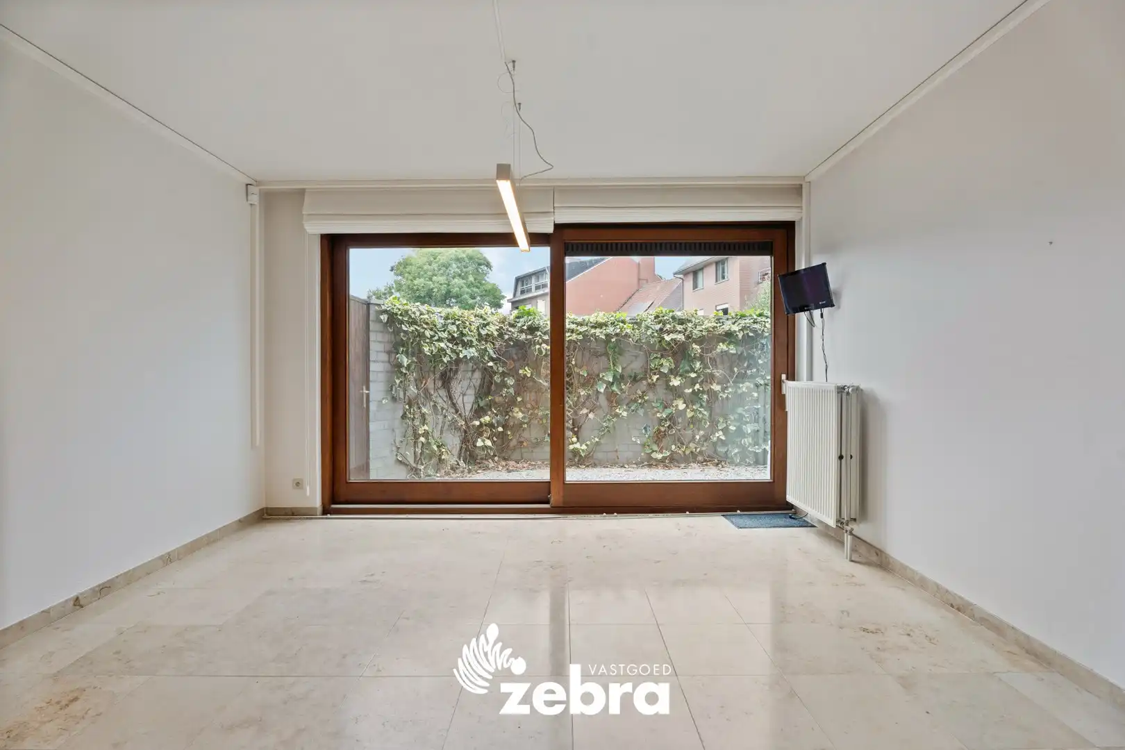 Veelzijdig handelspand op toplocatie in hartje Tielt – ook in te richten als woonst! foto 6