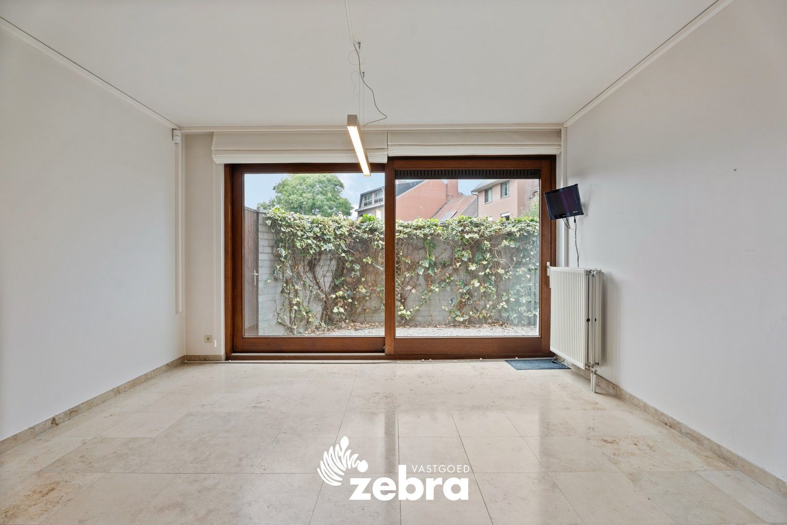 Veelzijdig handelspand op toplocatie in hartje Tielt – ook in te richten als woonst! foto 6