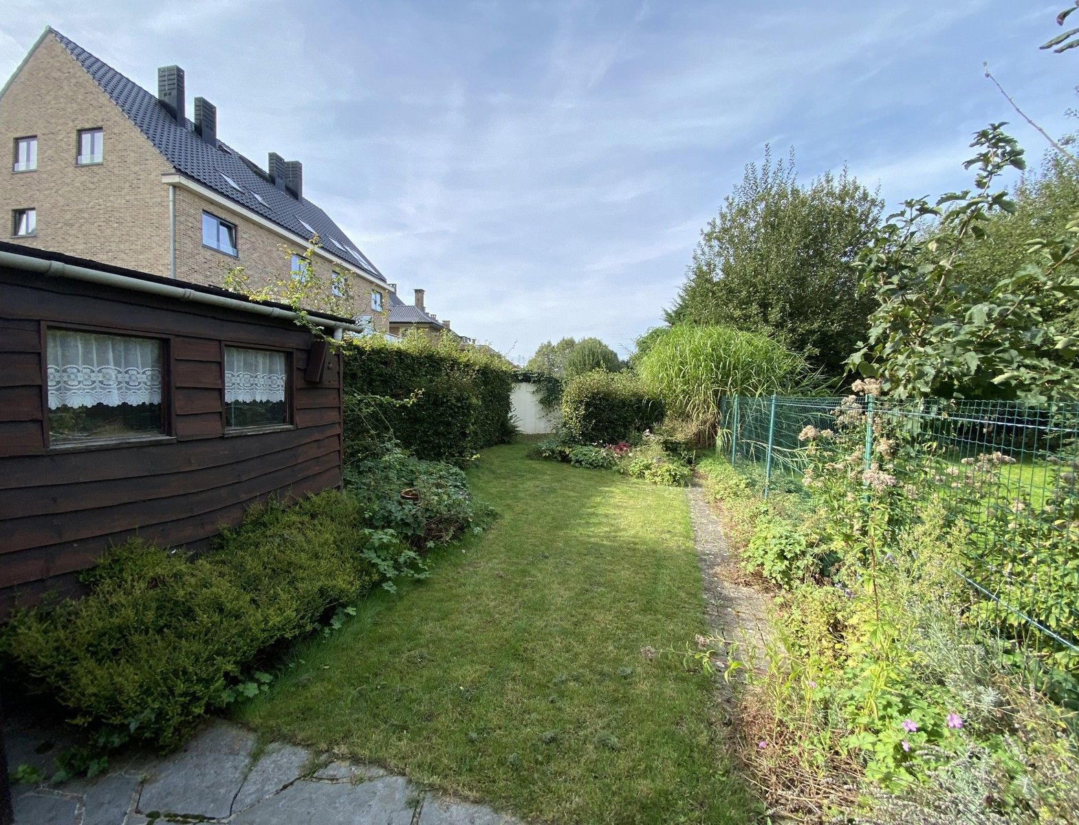 OPTIE Goed onderhouden woning met 4 slaapkamers en tuin foto 3