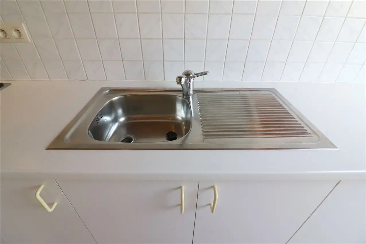 Gezellig dakappartement, grote leefruimte, 1 slpk. en garage  foto 20