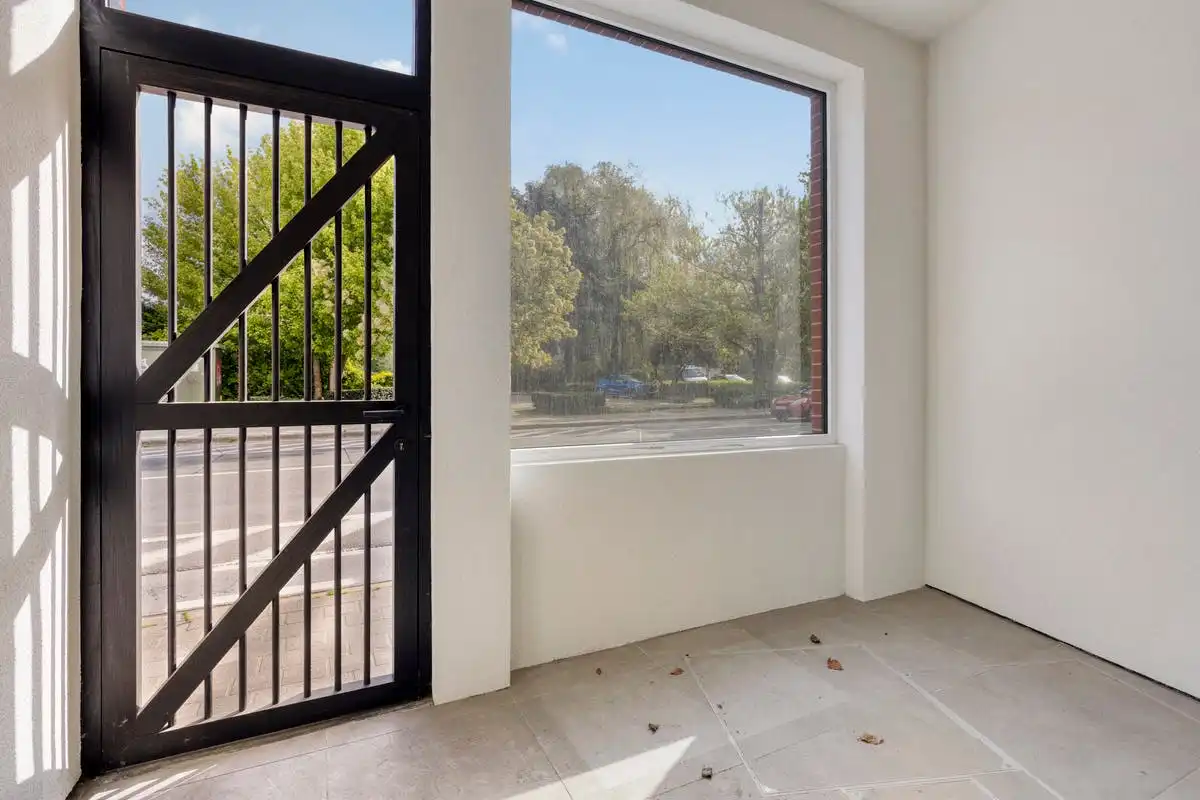 Instapklare totaalrenovatie met 3 slaapkamers in Kortrijk! foto 2