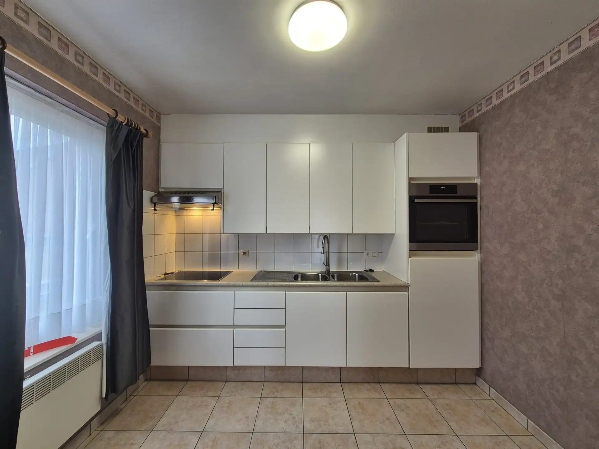 Ruim appartement met garage gelegen op het eerste verdiep vlakbij de Warande. foto 11