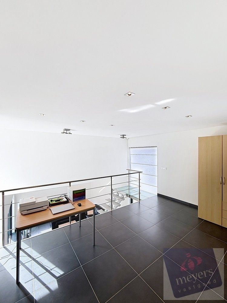 Ruime en energiezuinige gezinswoning met praktijk-/handelsruimte op toplocatie in Spalbeek foto 13