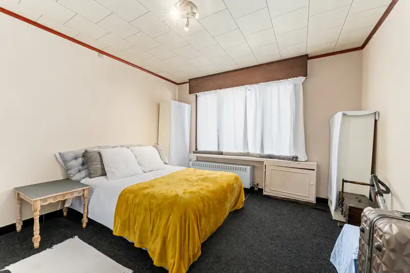 Ruime gezinswoning met 5 slaapkamers, handelsruimte en tal van mogelijkheden in het centrum van Kachtem foto 9