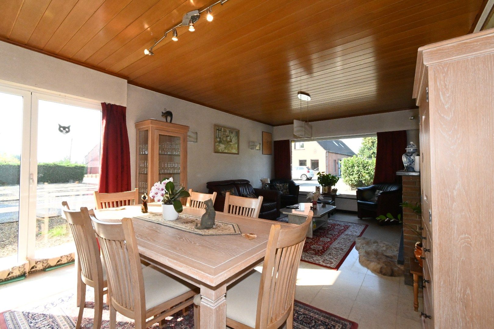 Alleenstaande woning met carport en tuin foto 5