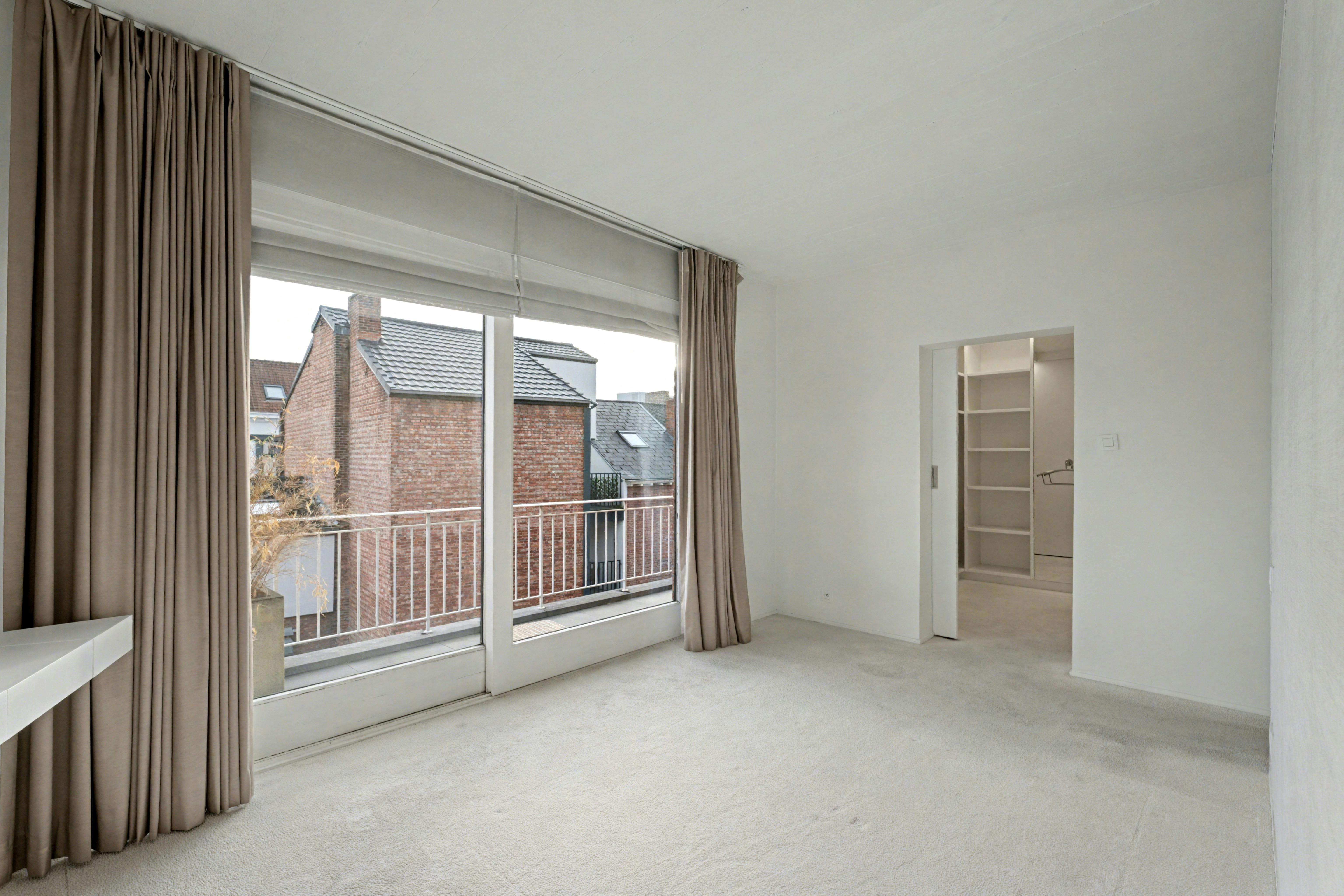Exclusief duplex-penthouse met adembenemend terras in hartje Hasselt foto 18