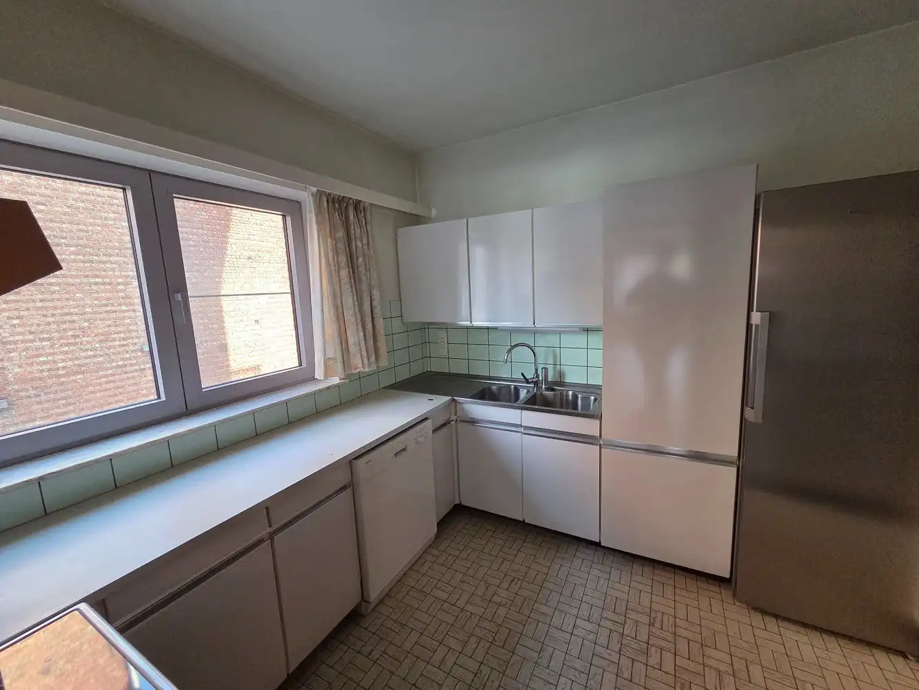 Uitzonderlijk ruim appartement met 4 slaapkamers, bureau en dubbele garage foto 7