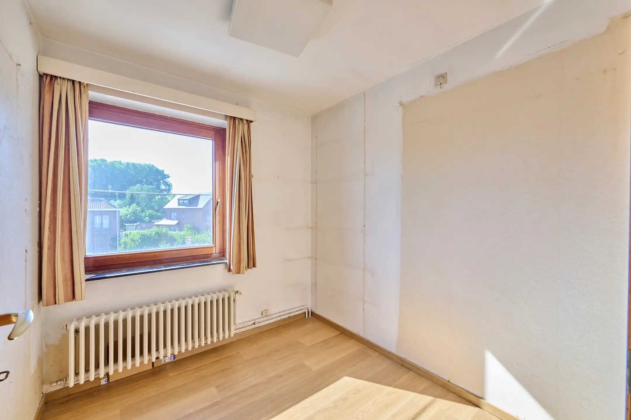 Goed onderhouden rijwoning op toplocatie met parking foto 11