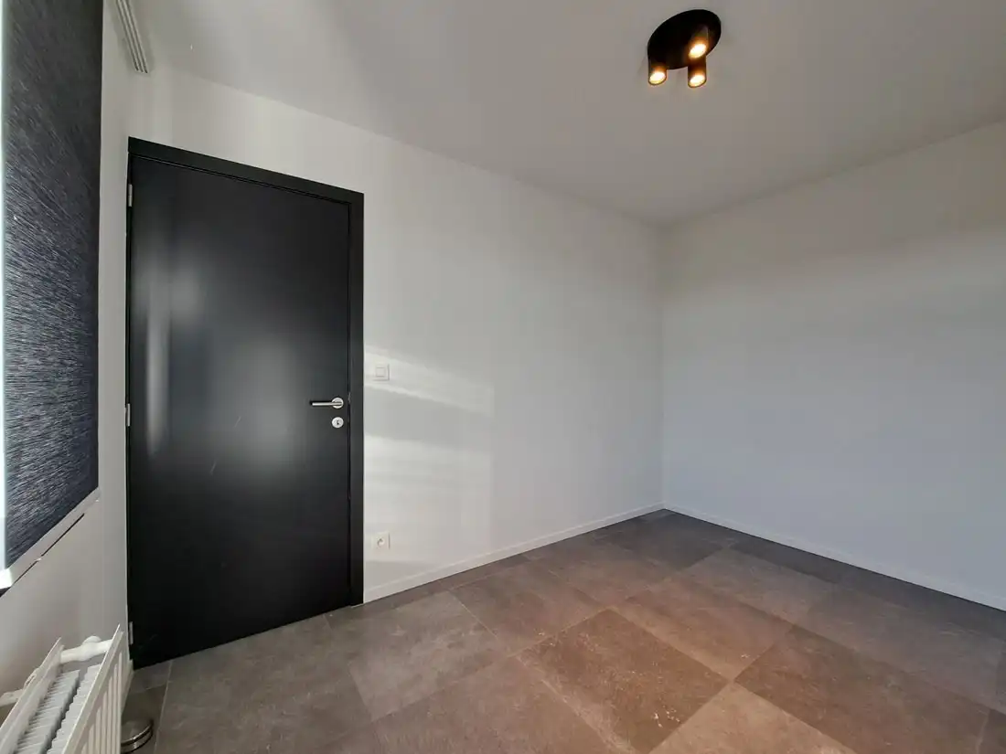 Instapklaar ruim duplex appartement te Rekem foto 13