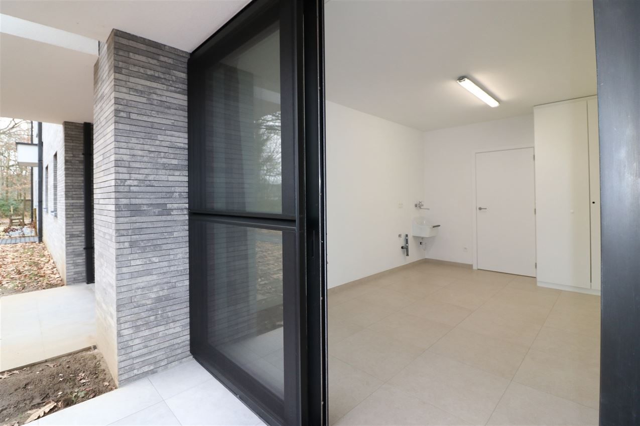  Ruim gelijkvloers app, garage, overdekt terras foto 18
