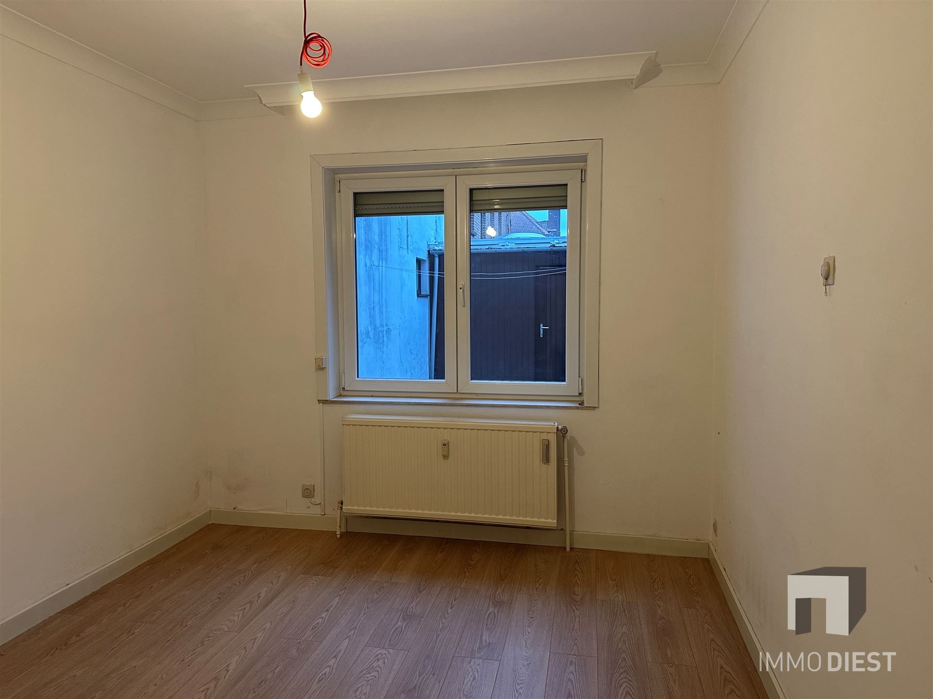 Gelijkvloers appartement met koer en 2 ruime slaapkamers foto 15