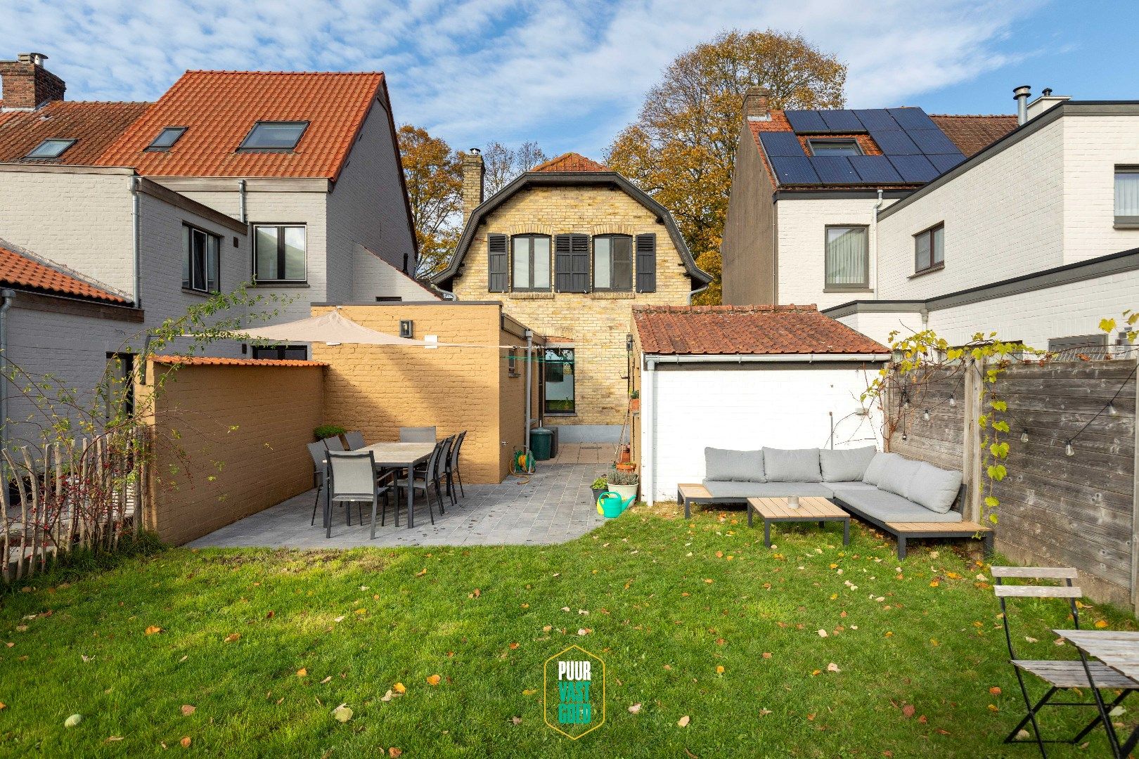 Karaktervolle half open woning met grote, zongerichte tuin, twee slaapkamers en berging in het hartje van Sint-Andries. foto 23