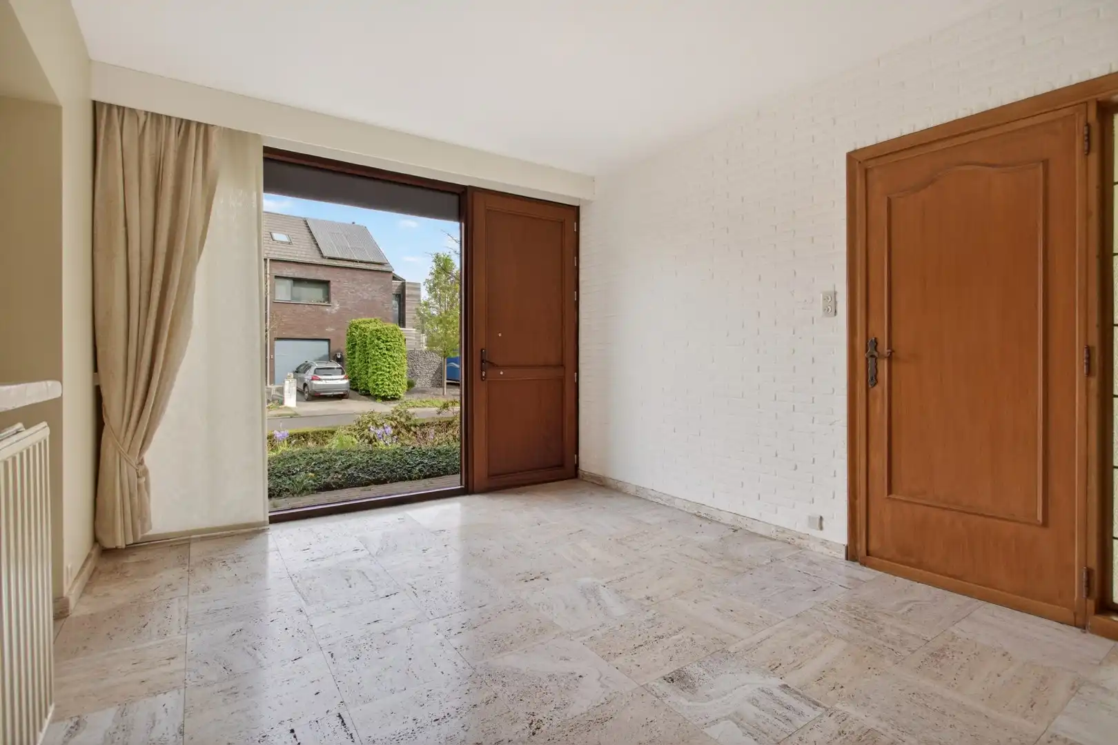 Ruime gelijkvloerse woning met veel potentieel op rustige ligging in Mol foto 8