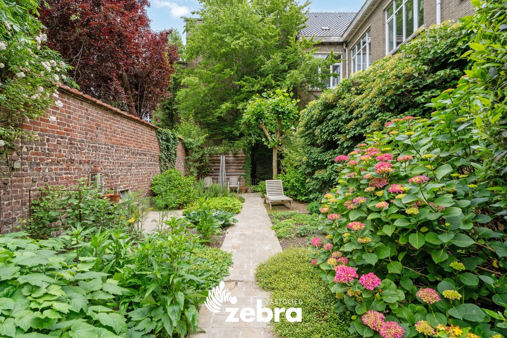 Karaktervolle herenwoning met ruime tuin in hartje Roeselare! foto 32