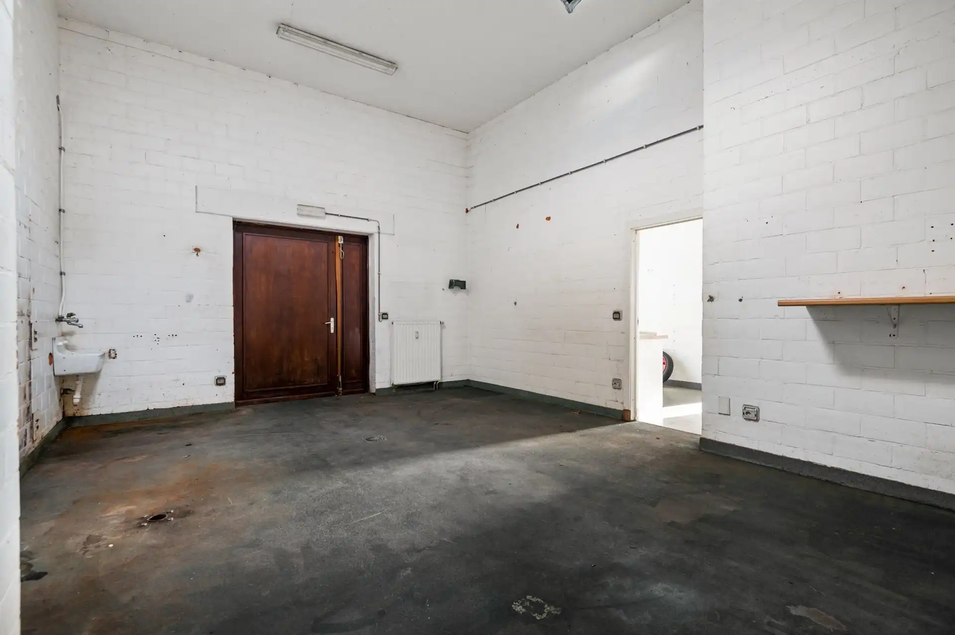 Handelspand met ruim appartement op een toplocatie in Sint-Gillis-Waas foto 8