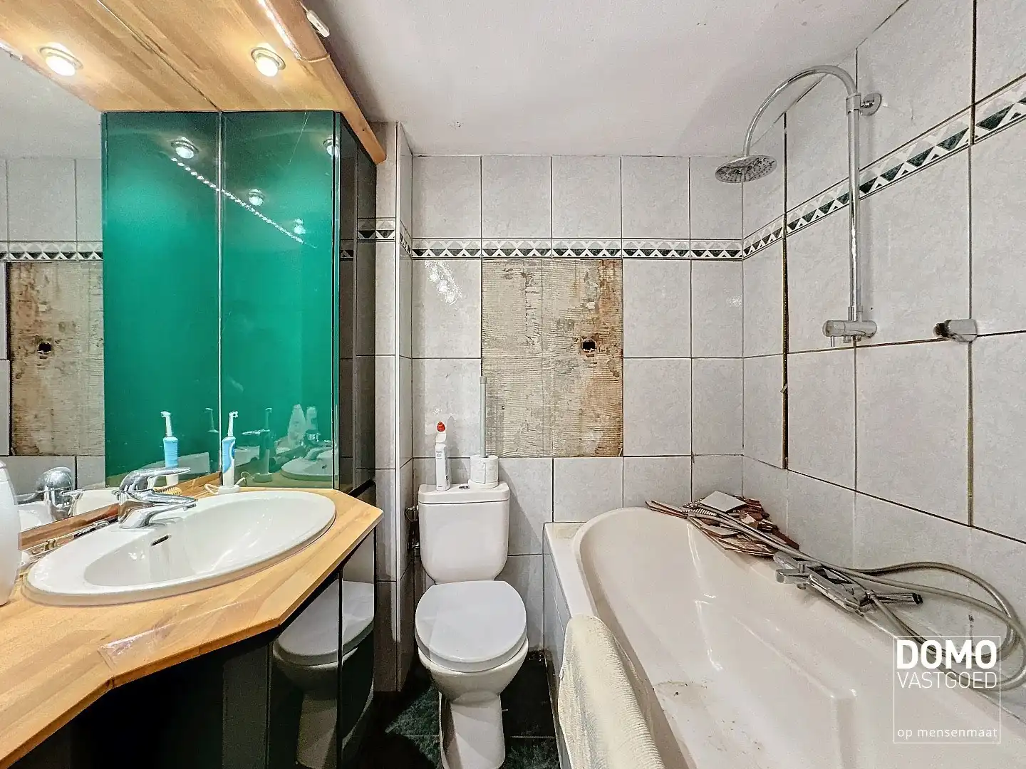 Te renoveren handelshuis gelegen in het centrum van Diepenbeek. foto 8