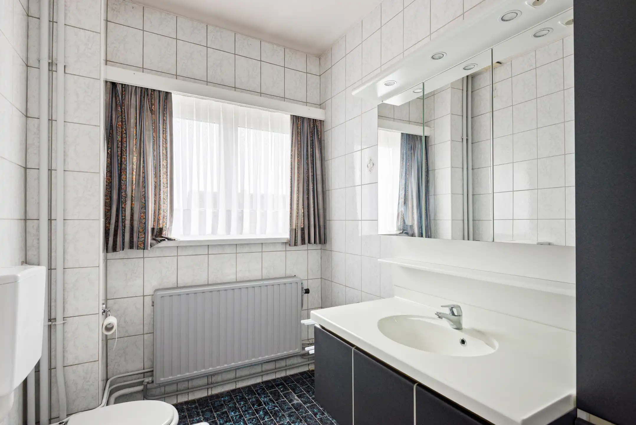 Halfopen woning met dubbele garage op mooie locatie foto 15