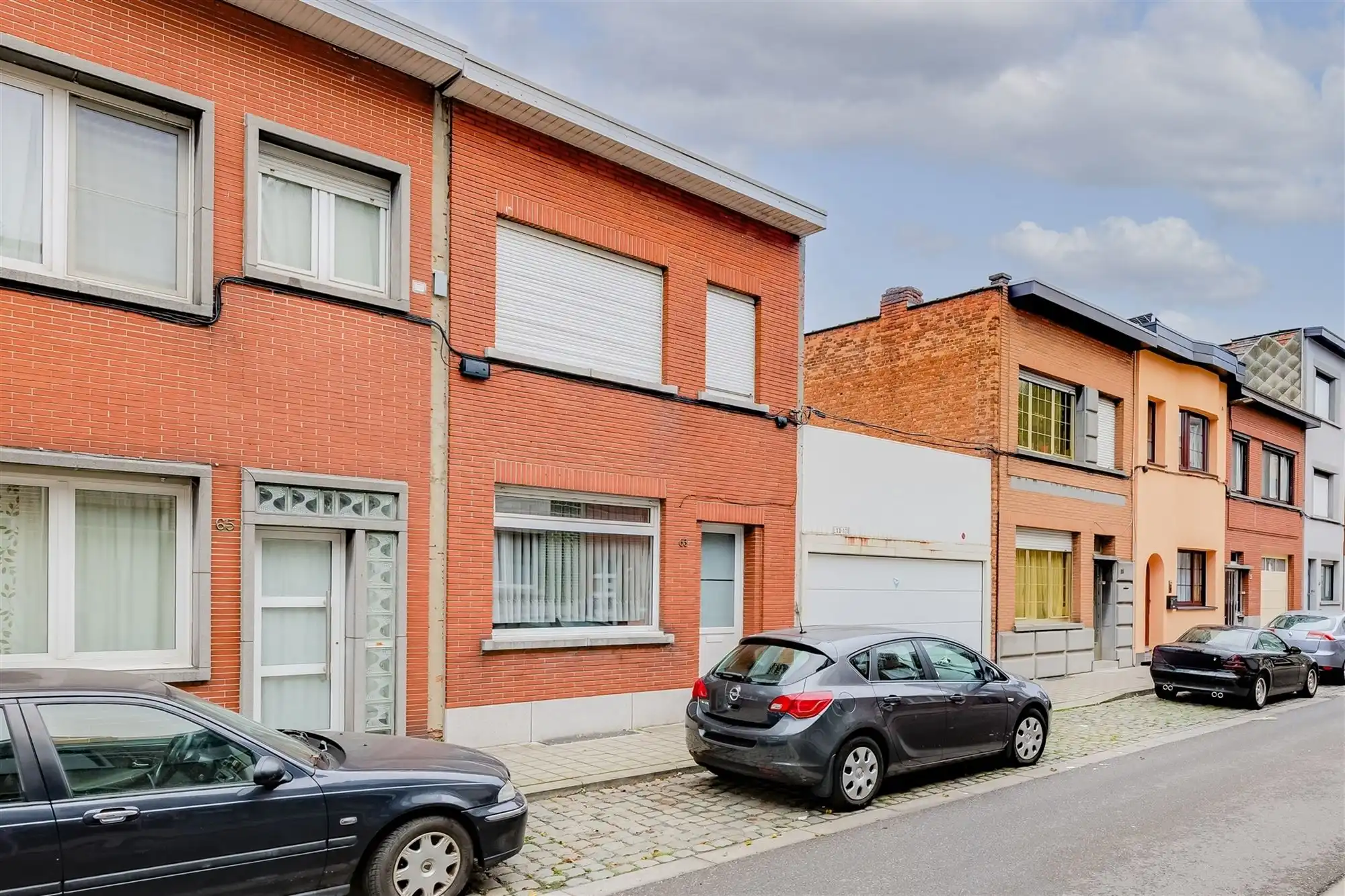 Te renoveren woning met tuin in Merksem foto 2