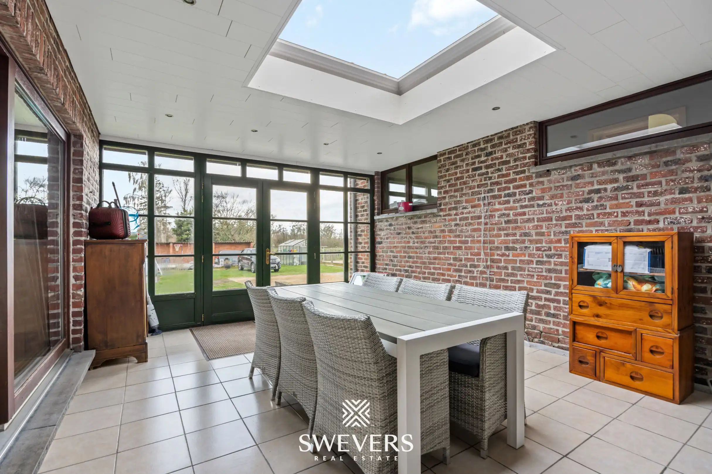 Zonnige woning met ruime zuid georiënteerde tuin in het rustige Diepenbeek foto 17