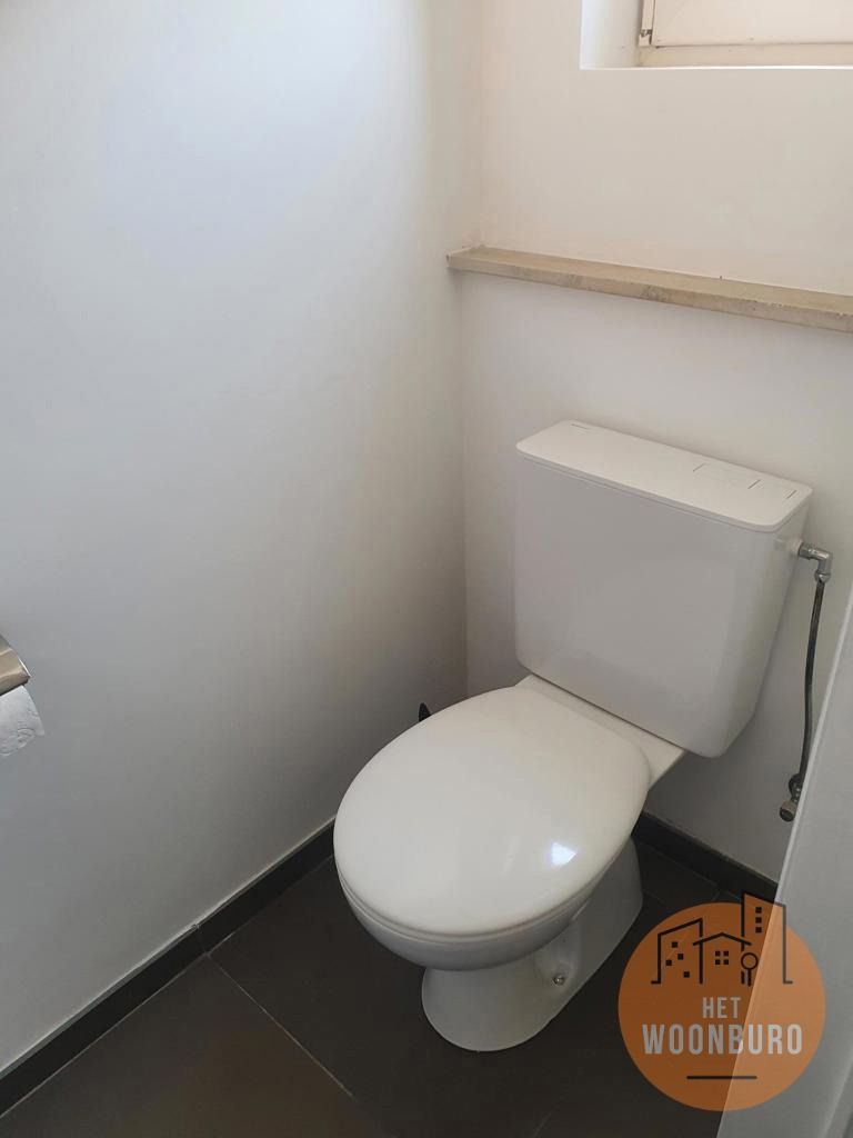 Prachtig gelijkvloersappartement met 3 slpks, garage en tuin foto 10