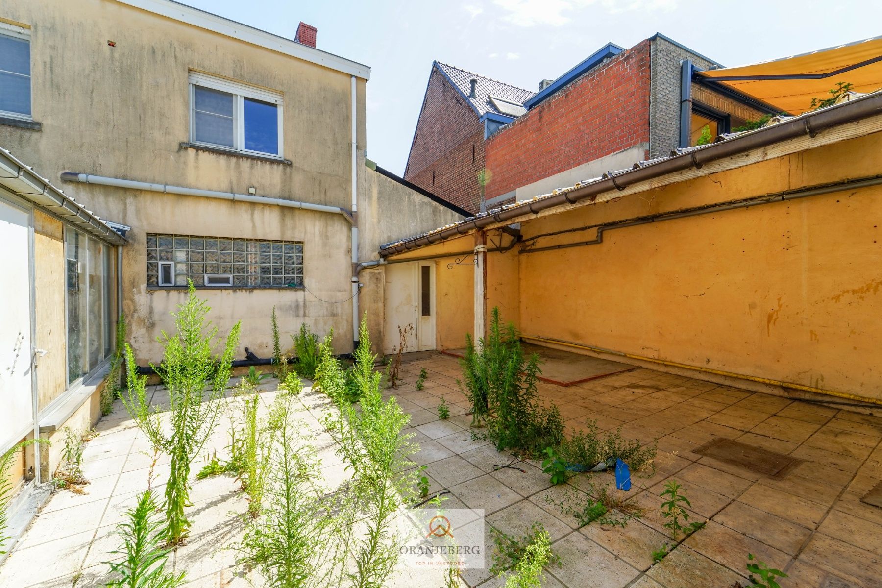 Ideaal te renoveren rijwoning + werkplaats + garage + tuin voor 591m² foto 16