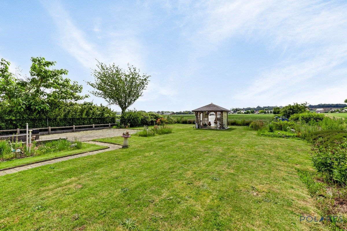 Te renoveren Bungalow in Herent met prachtige Tuin en veel potentieel foto 21