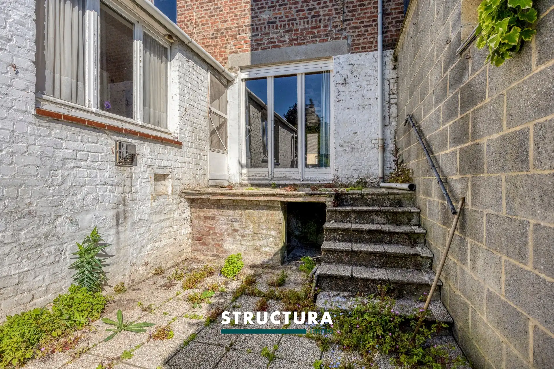 Centraal gelegen renovatiewoning met tuin foto 6