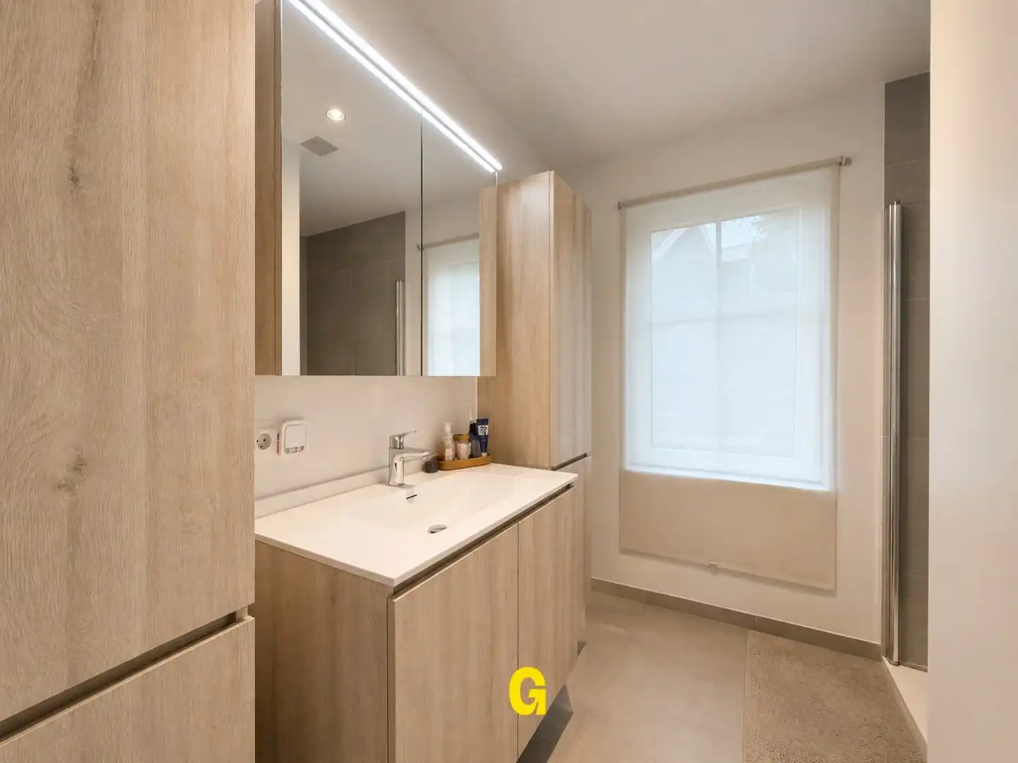 Knap afgewerkt gelijkvloersappartement met 2 slaapkamers, ruim terras en tuintje met tuinberging foto 13