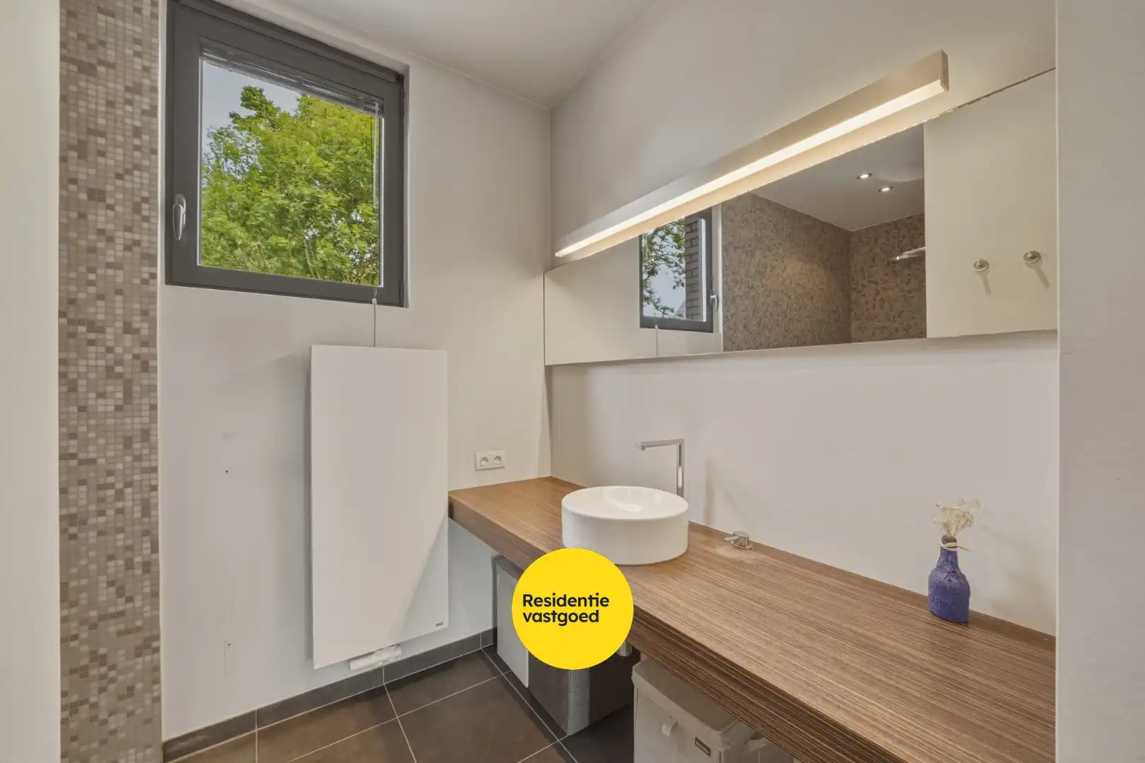 Ruime instapklare woning met zongerichte tuin in hartje Oudenburg foto 19