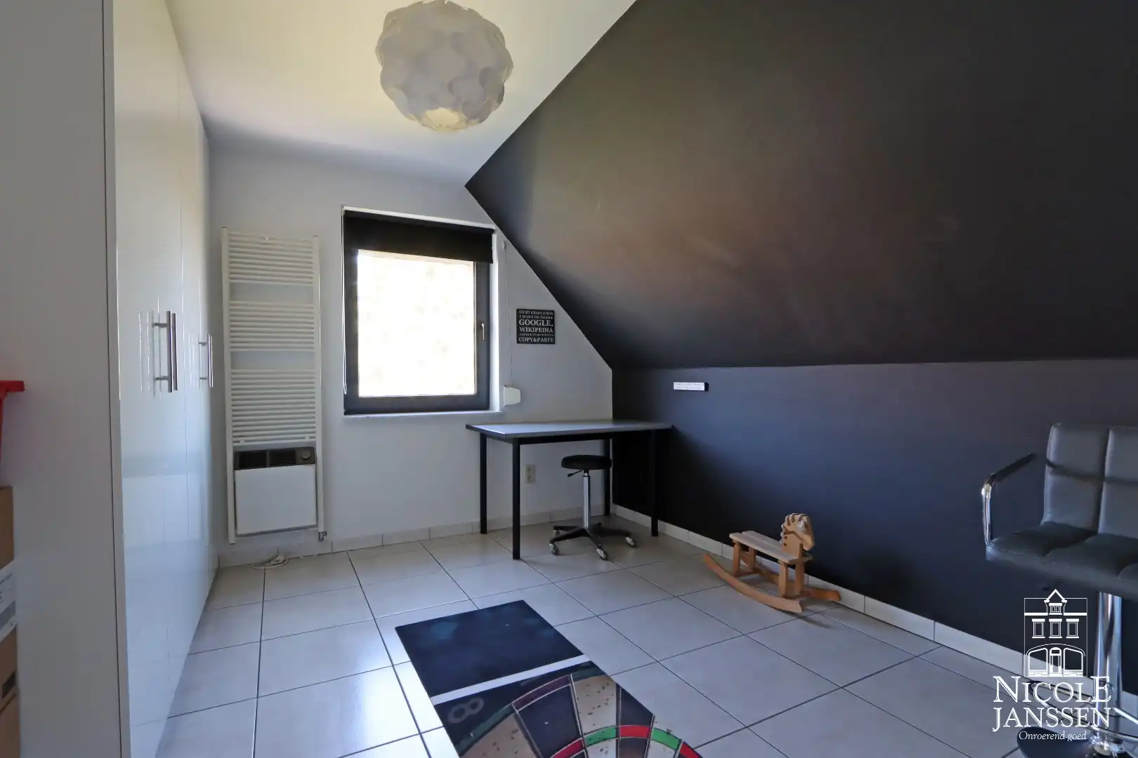 Instapklare woning met ruimte voor praktijk en mooie ingesloten tuin in Bree centrum foto 28