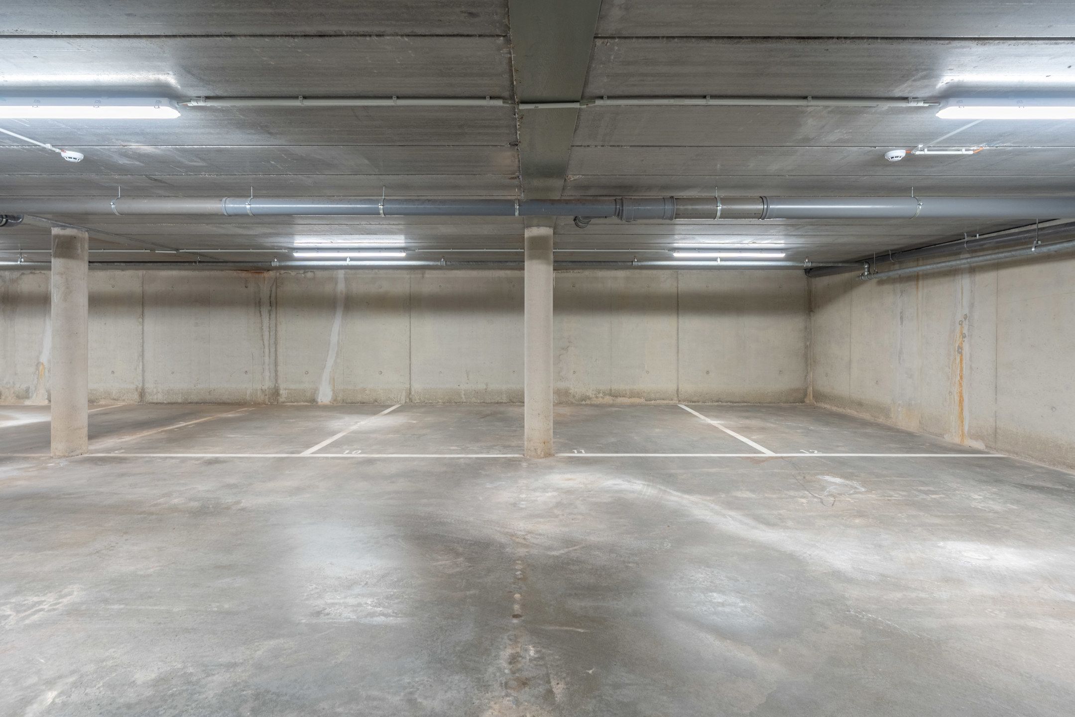 Zeer gunstig gelegen ondergrondse autostaanplaatsen te koop! foto 10