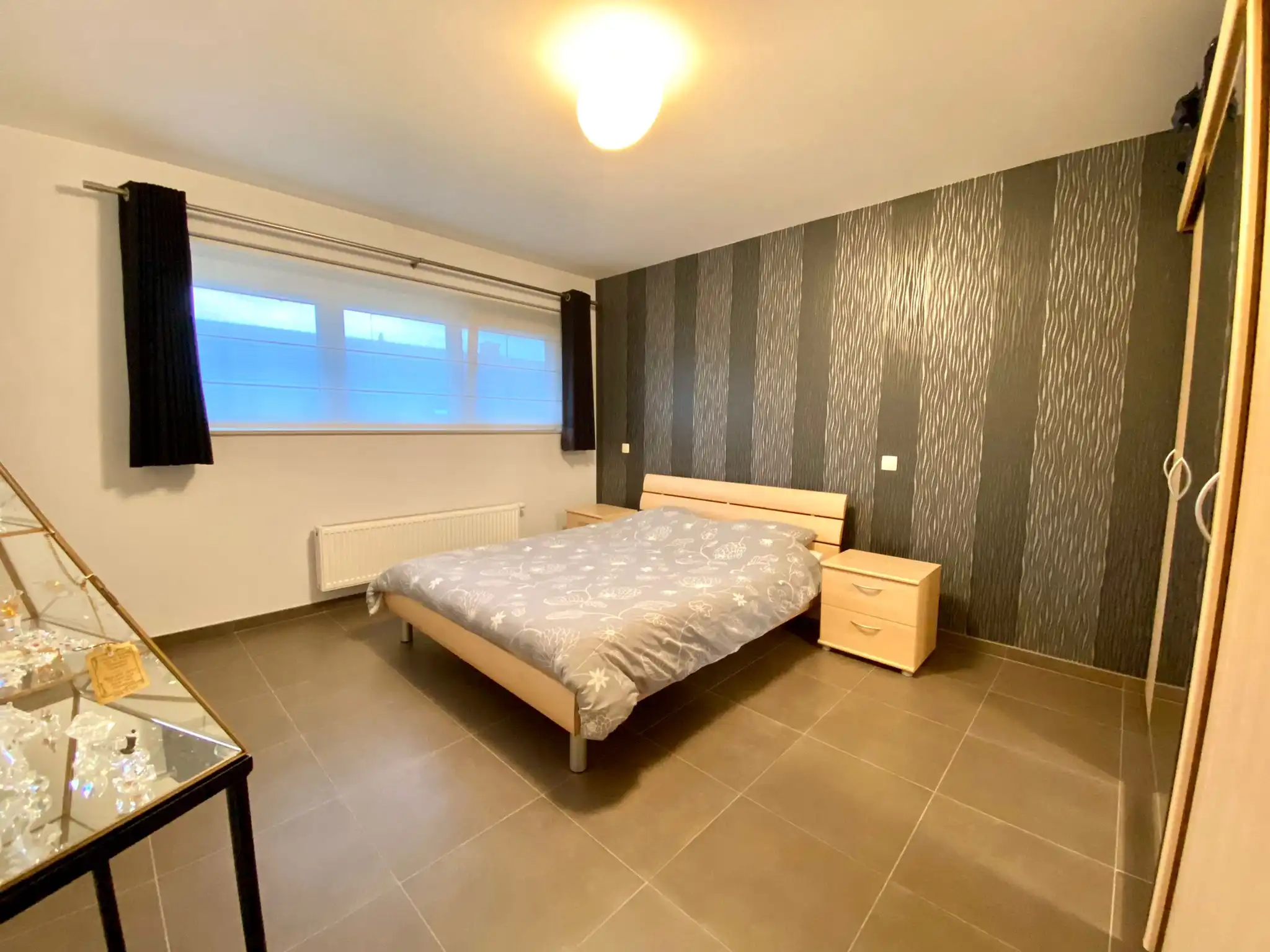Centraal gelegen woning met drie slaapkamers, garage en tuin foto 5