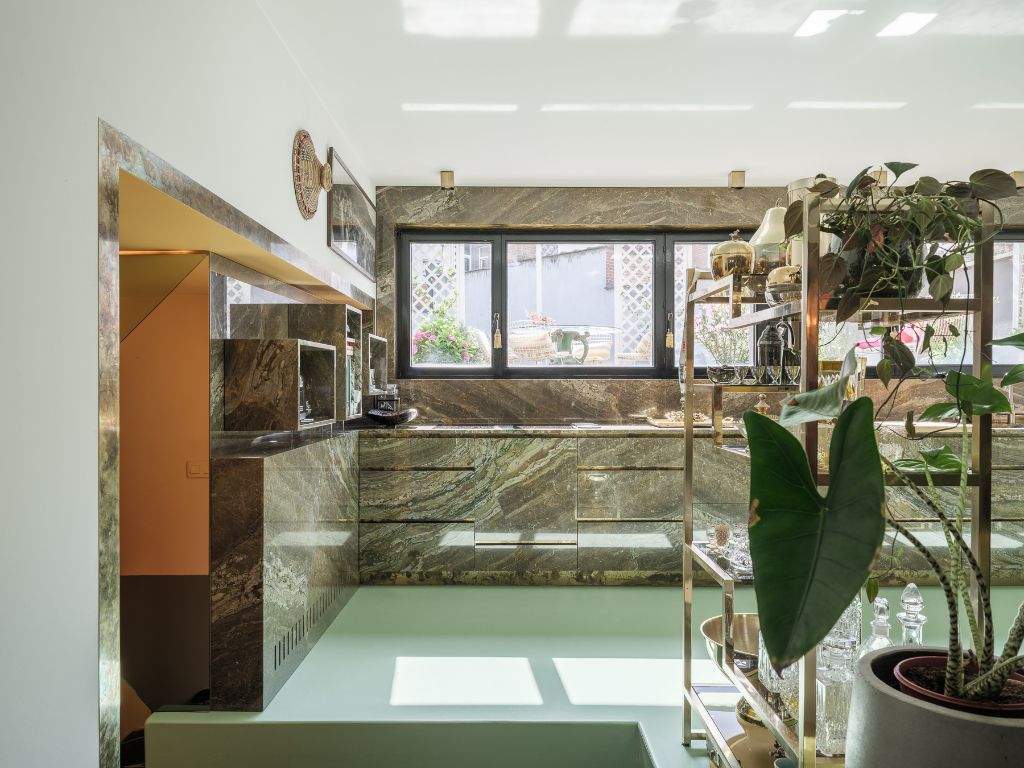Imposant designappartement met loftallures nabij het Wintercircus en De Krook foto 9