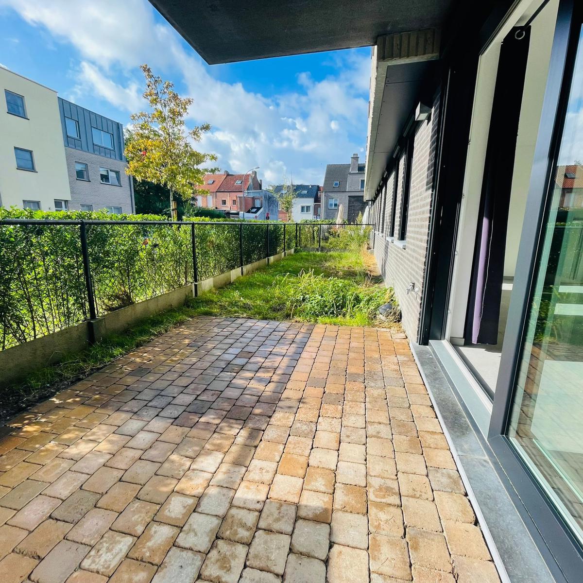 Gelijkvloers 2 slpk-appartement met tuintje foto 11