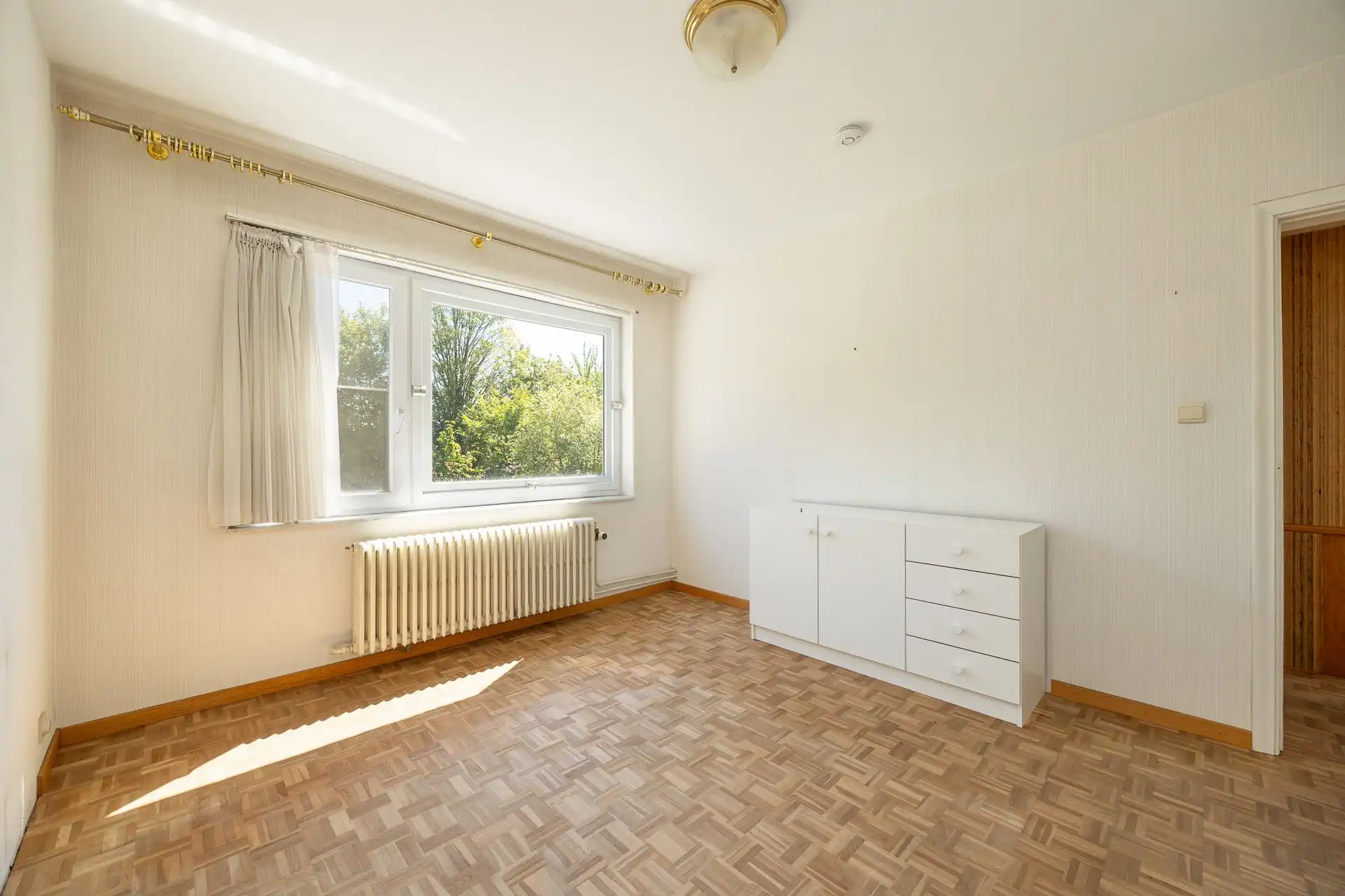 Ruime halfopen bebouwing met garage en zonnige tuin foto 15