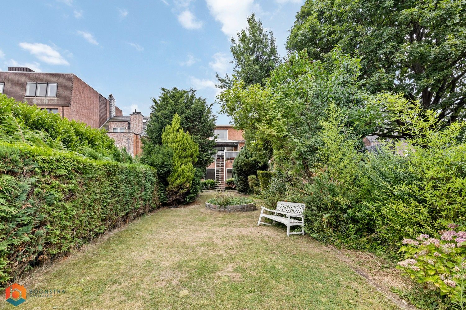Handelsgelijkvloers met woonst en gezellige tuin in centrum Putte foto 13