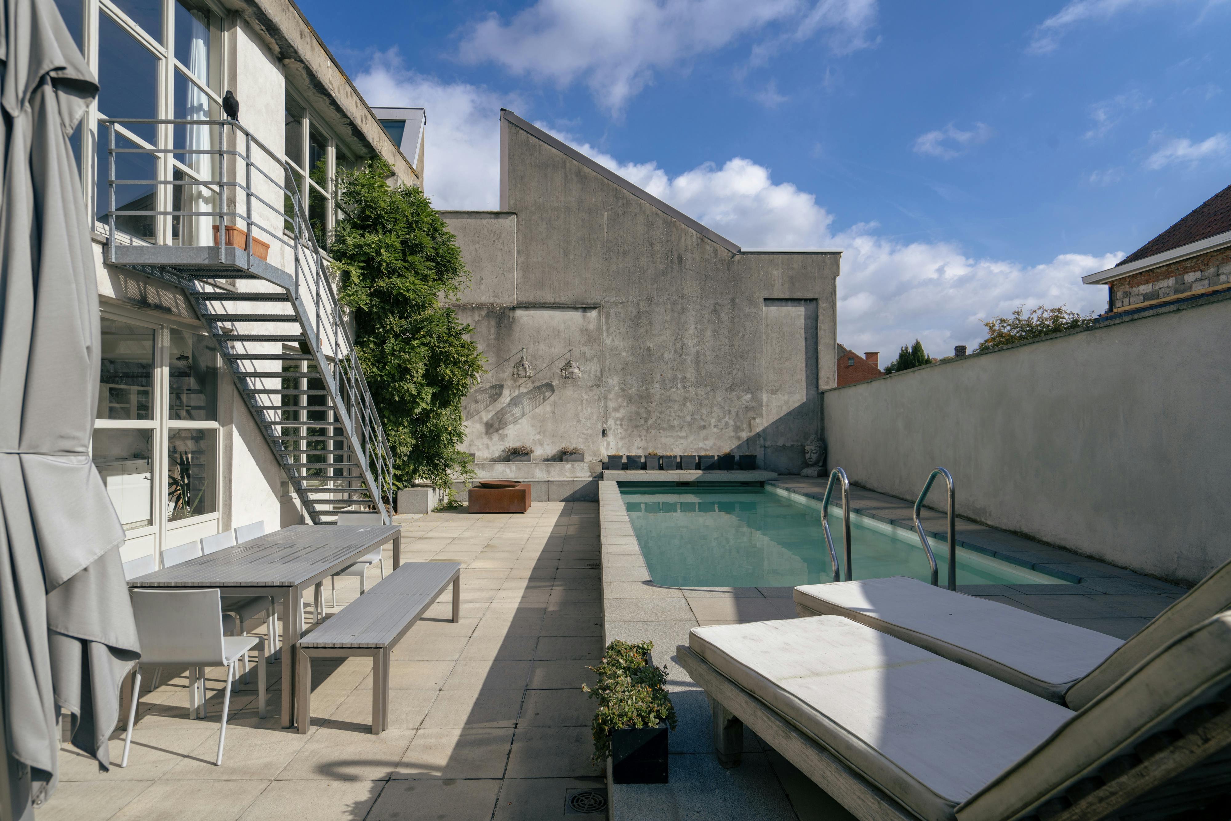 Exclusieve loftwoning met zwembad en loods te koop in Lauwe foto 13