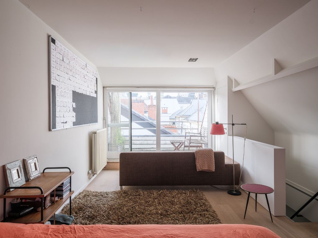 Centrum Gent - Een architecturale hoekwoning met een exeptionele ruimtelijkheid, twee slaapkamers en twee buitenruimtes. foto 13