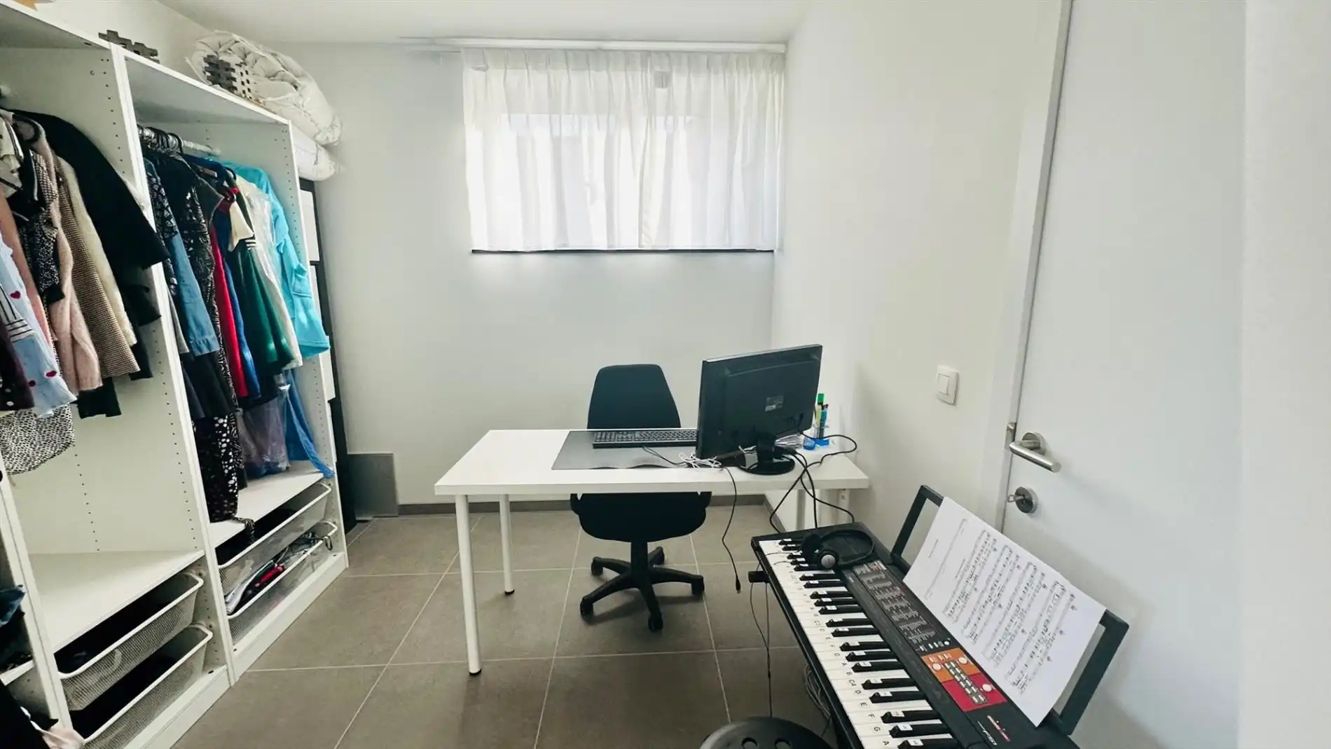 Gelijkvloers appartement met zonnepanelen - tuin - garage foto 7