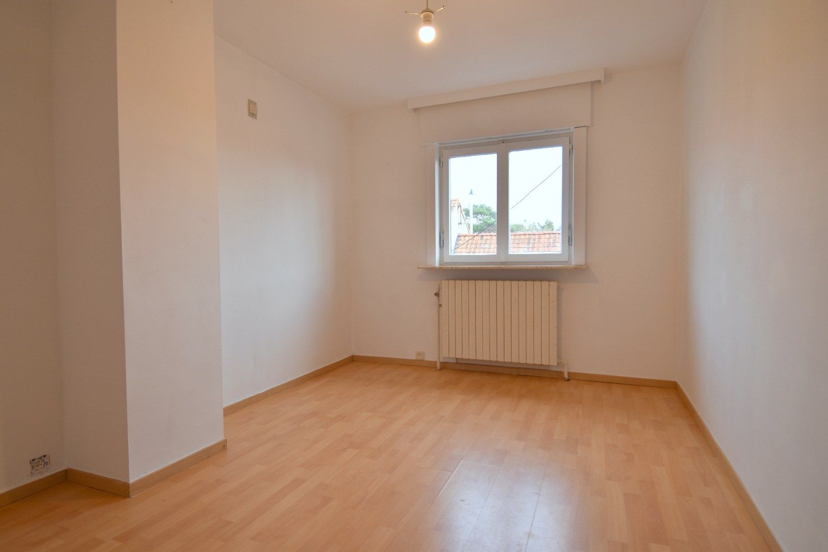 Ruime bel-etage woning met tuin, garage en 3 slaapkamers in Bissegem foto 8