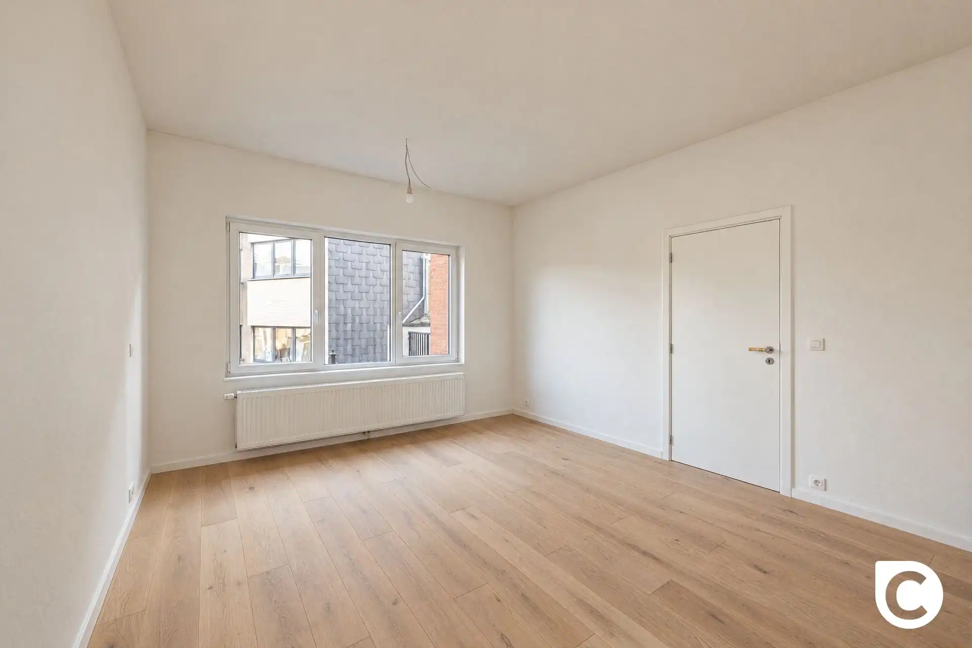 Hoogwaardig gerenoveerd 2 slpk app met terras foto 11