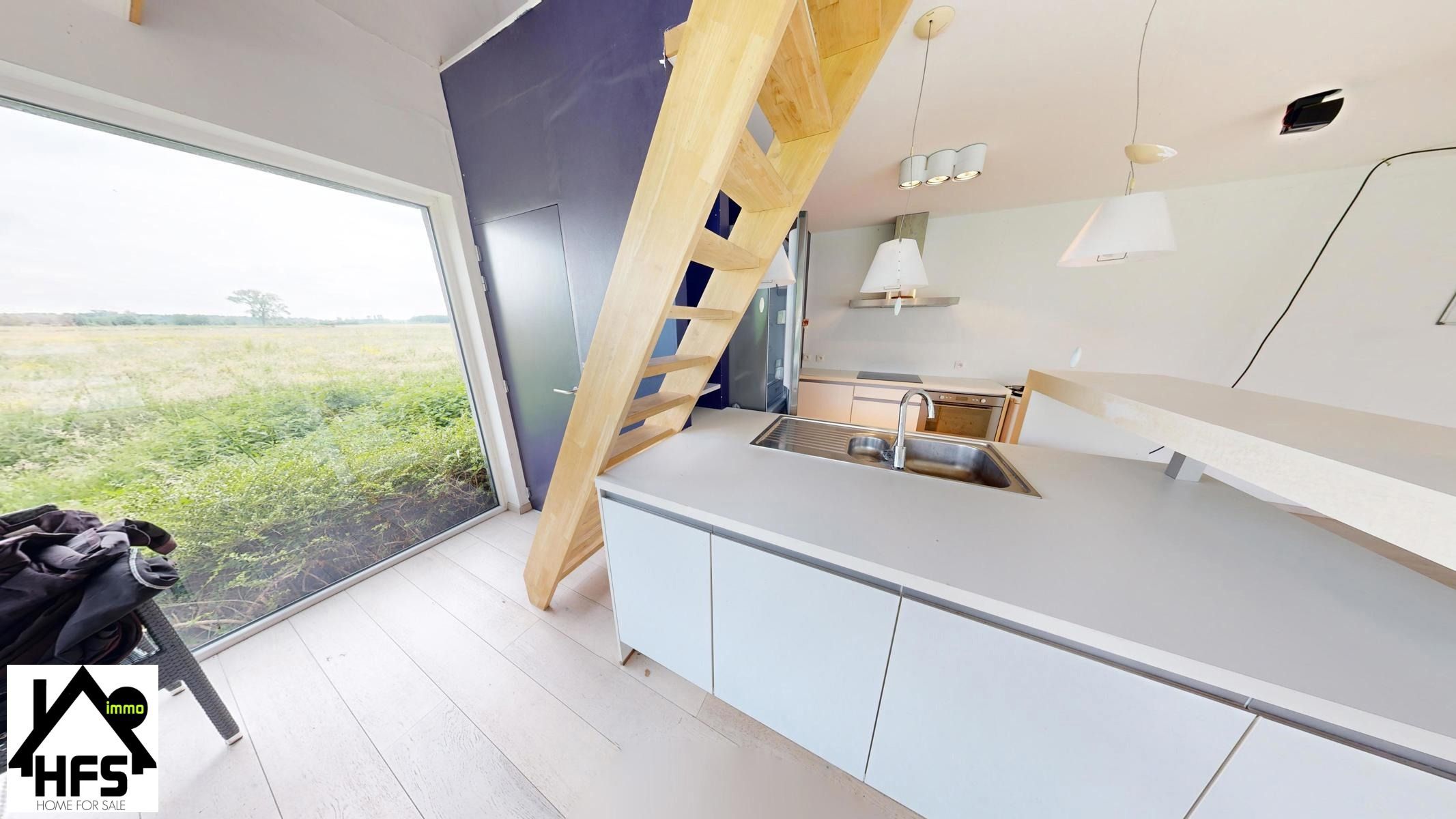 Ruime op te frissen villa met zicht op de weides met tof bijgebouw foto 26